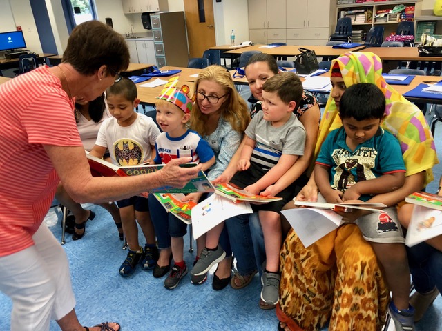Family Literacy Program – Literacy Volunteers of Collier County Parents and children sitting in a circle reading together